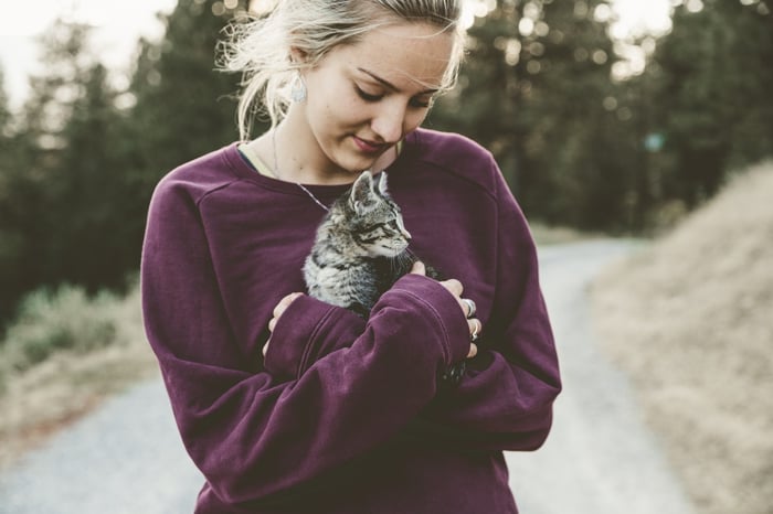 Woman holding a kitten